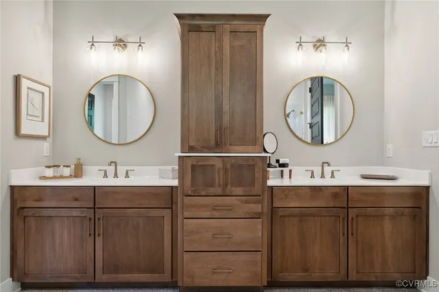 a living room with furniture a ceiling fan and a large window