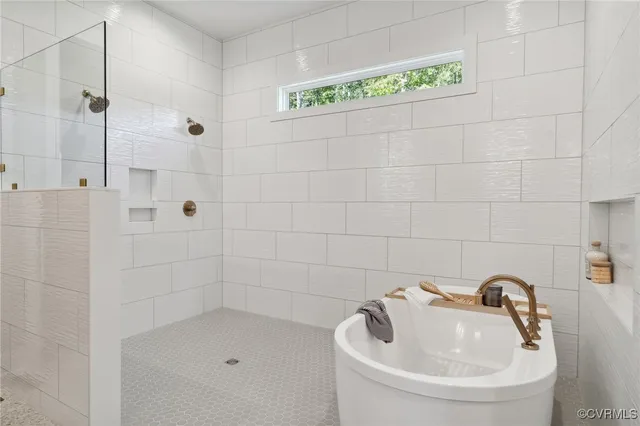 a bathroom with a sink and a shower