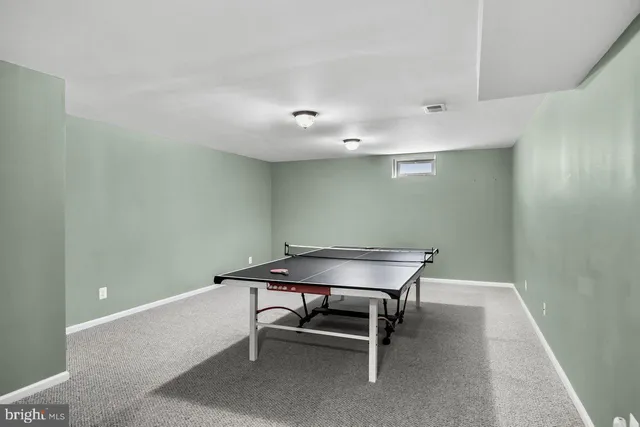 a room that has a table and chair in it