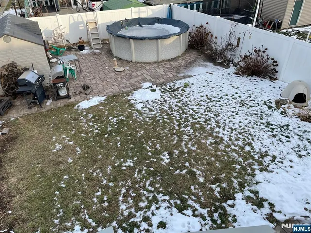 a view of a backyard of a house