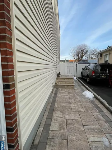 a couple of cars parked in front of buildings