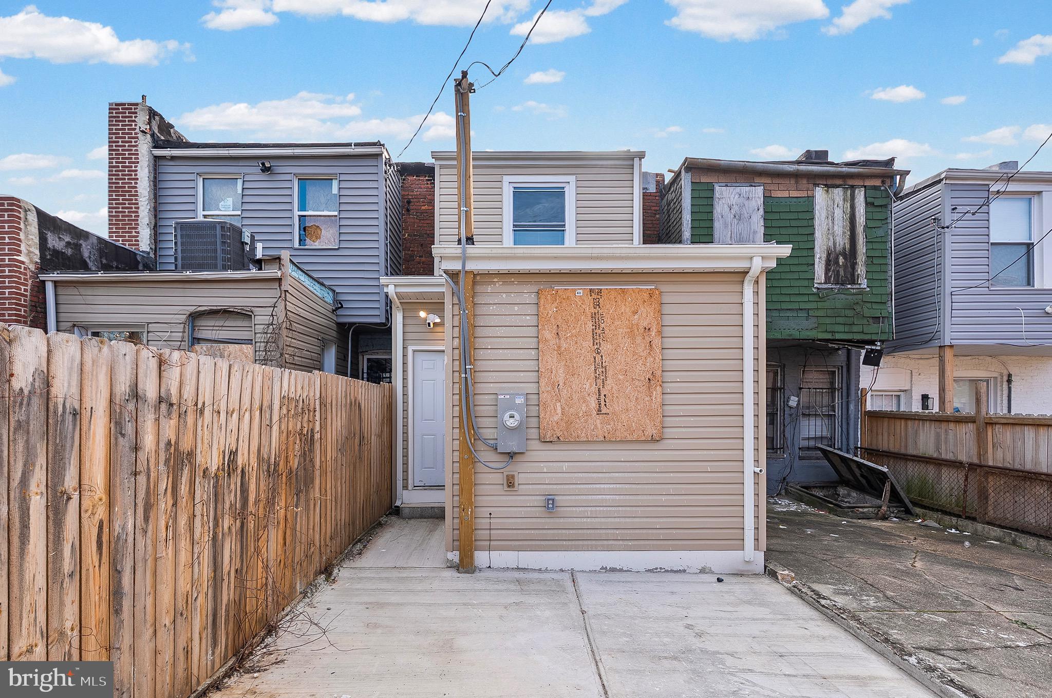 2508 East Preston Street Baltimore, MD 21213 - Photo 29 of 29 a view of a house with wooden fence