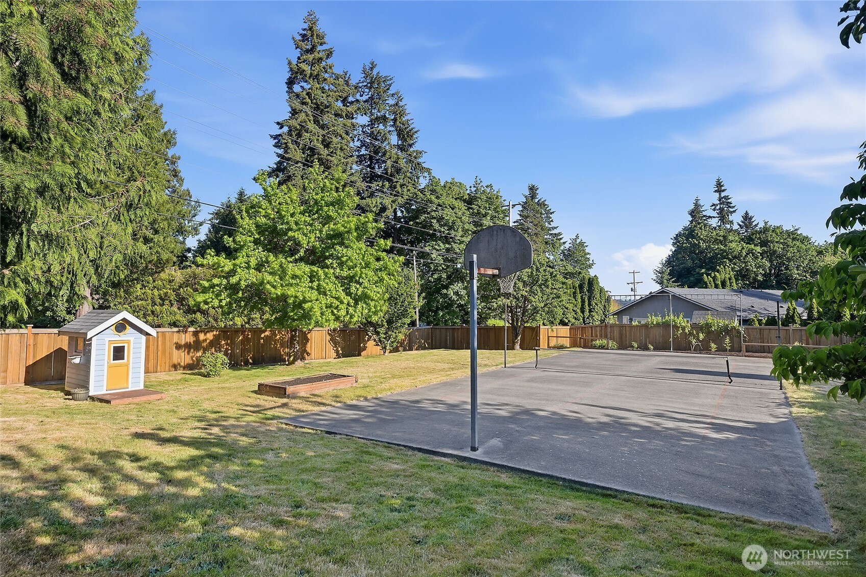 23707 Meridian Place West Bothell, WA 98021 - Photo 34 of 40 a street sign on a sidewalk next to a road