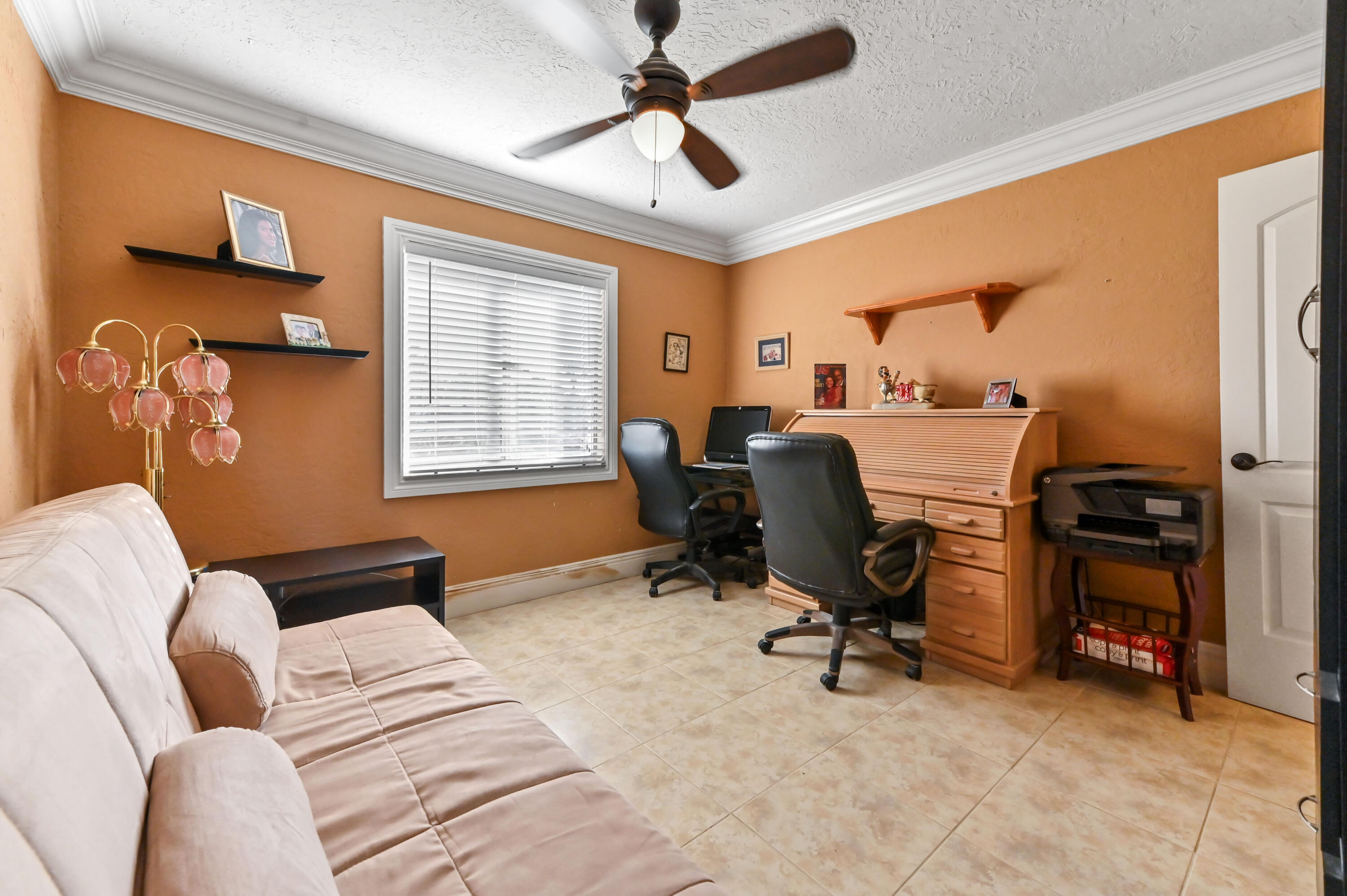 1100 Summer Street, Unit 1 Palm Springs, FL 33461 - Photo 18 of 34 a view of a livingroom with workspace and a window