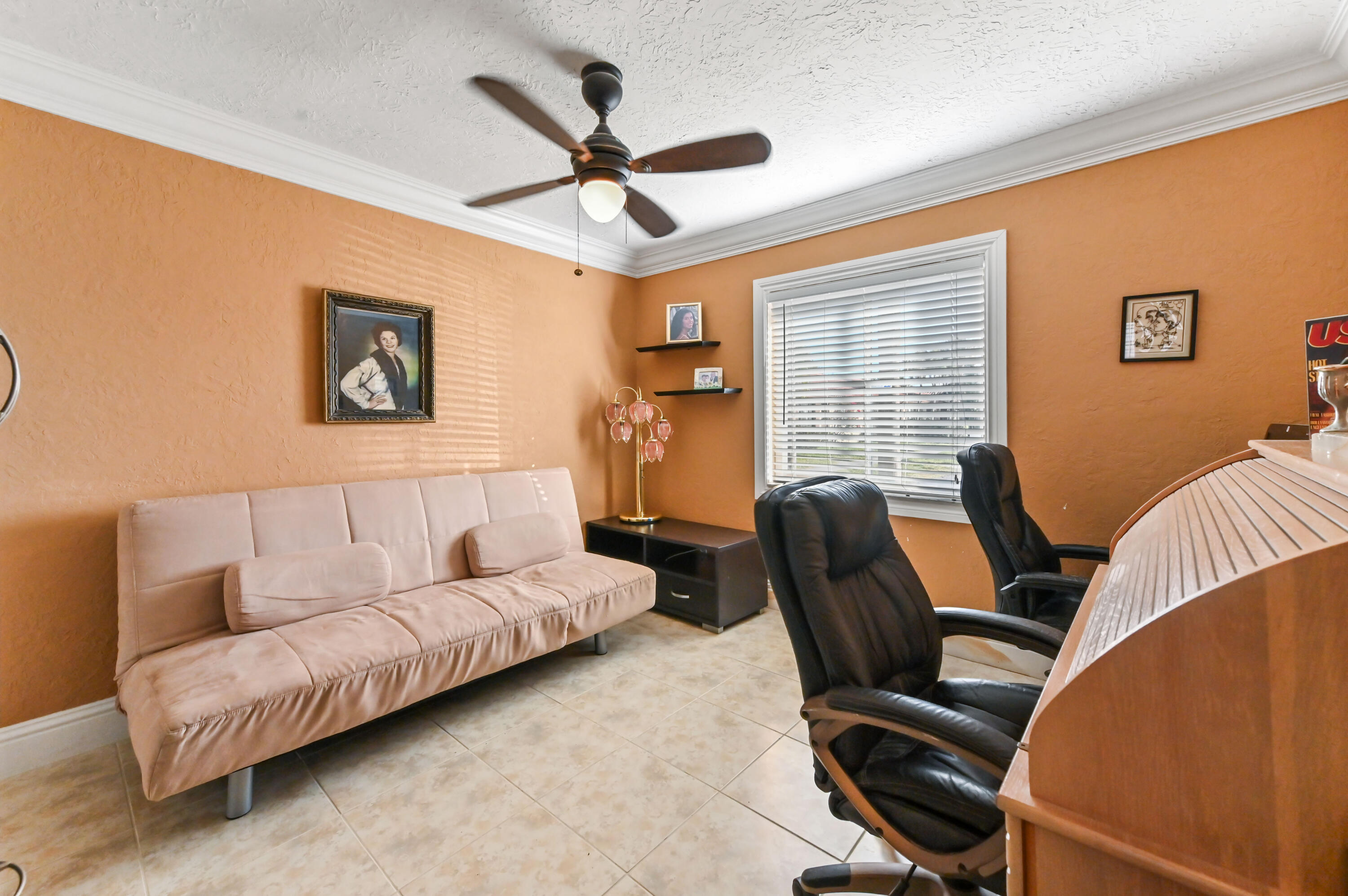 1100 Summer Street, Unit 1 Palm Springs, FL 33461 - Photo 19 of 34 a living room with furniture and a window
