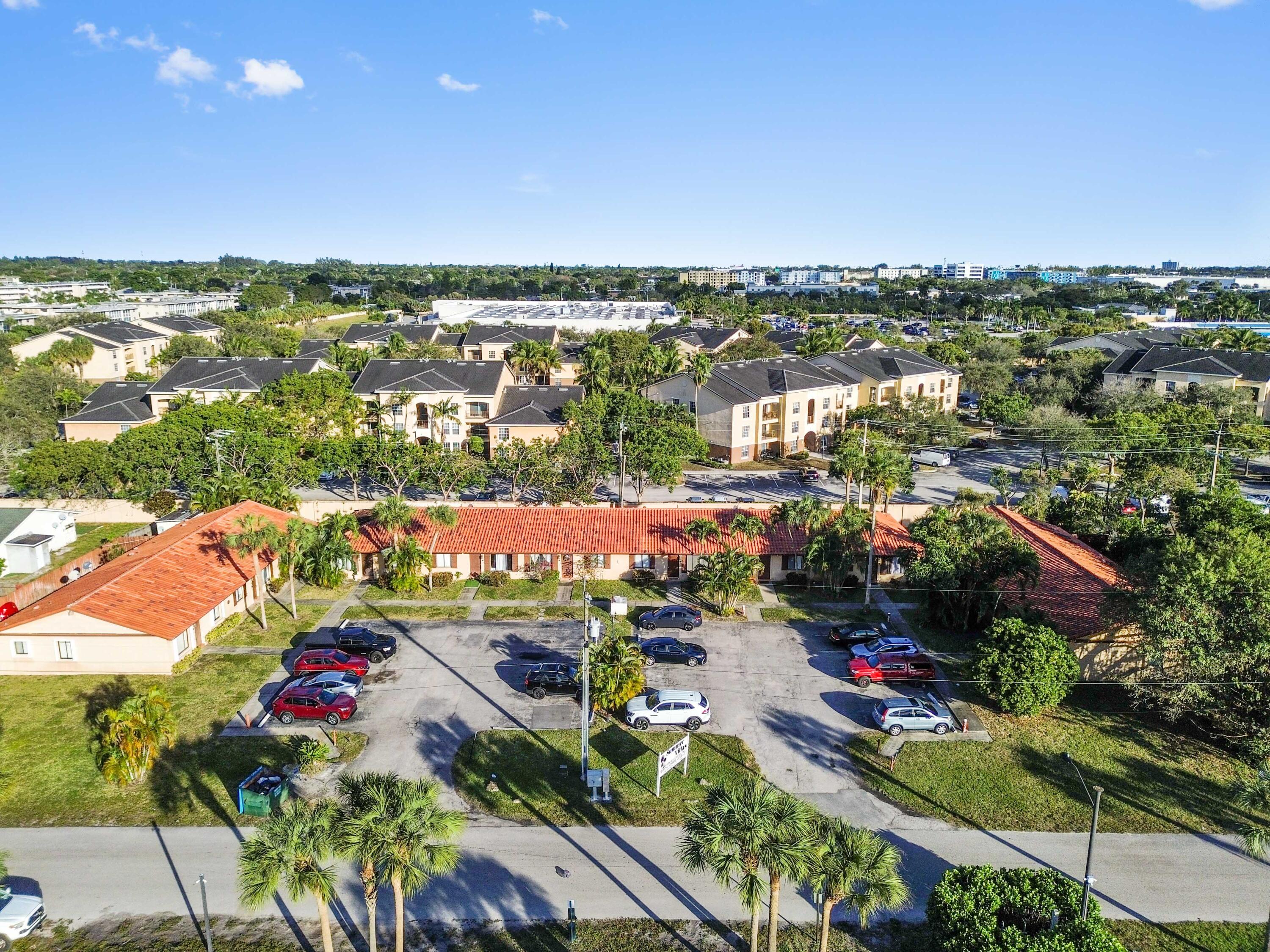 1100 Summer Street, Unit 1 Palm Springs, FL 33461 - Photo 26 of 34 an aerial view of residential houses with outdoor space