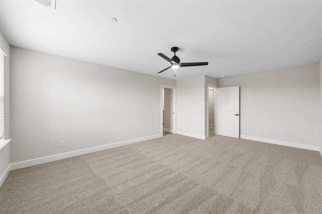 437 MB's Way Pilot Point, TX 76258 - Photo 4 of 8 a view of an empty room with a ceiling fan