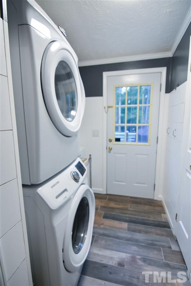 727 Ned Moore Road Timberlake, NC 27583 - Photo 21 of 24 a utility room with dryer and washer