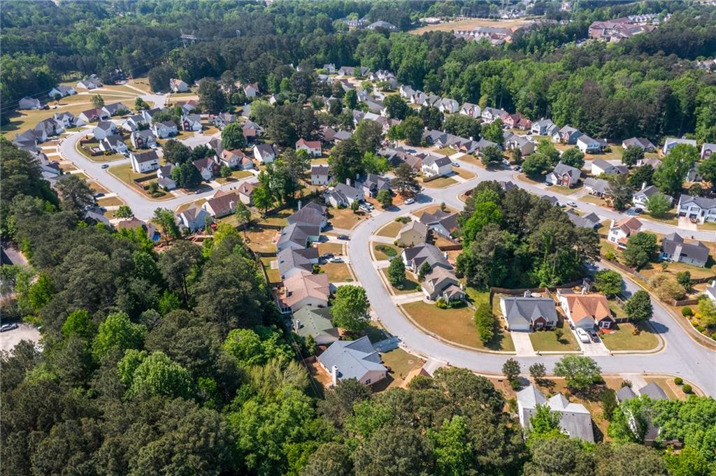 2110 Racquet Club Circle Northwest Lawrenceville, GA 30043 - Photo 42 of 44 an aerial view of residential houses with outdoor space