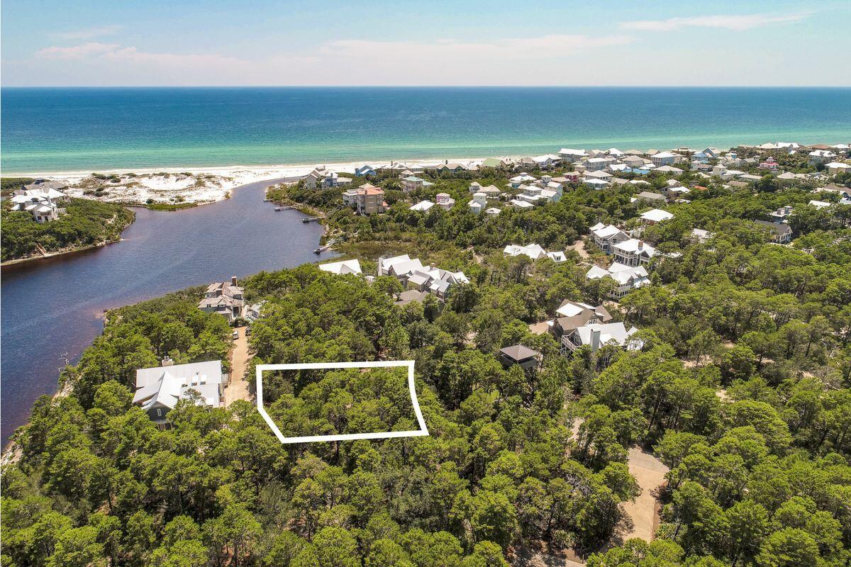8-9 Sinclair Lane Santa Rosa Beach, FL 32459 - Photo 1 of 21 an aerial view of ocean with residential houses with outdoor space