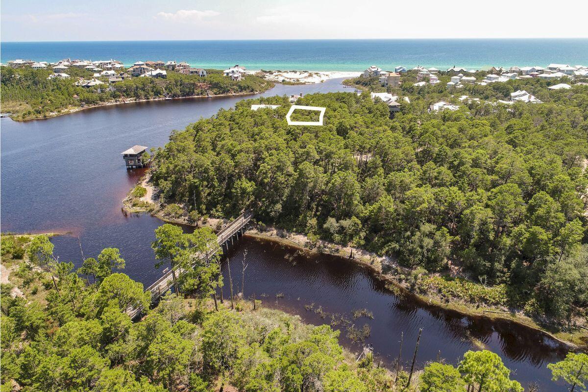 8-9 Sinclair Lane Santa Rosa Beach, FL 32459 - Photo 3 of 21 an aerial view of residential houses with outdoor space and lake view