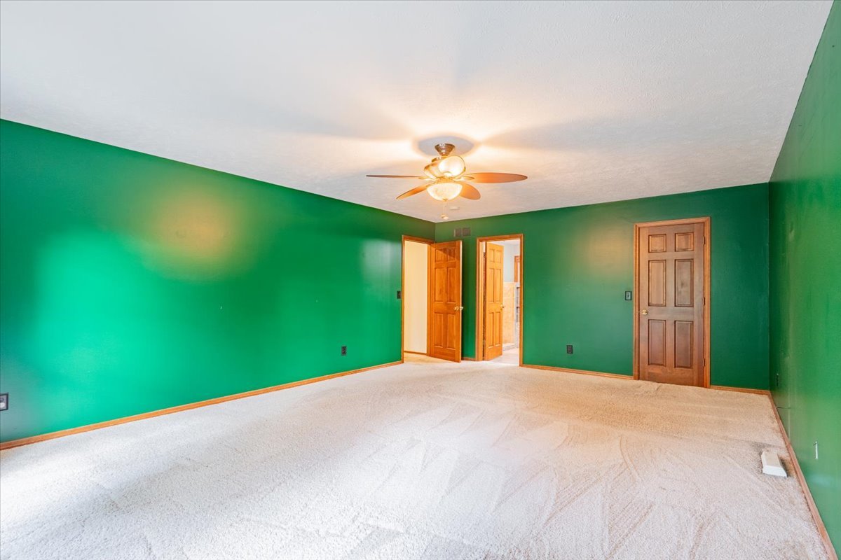 10 Inverness Drive Bloomington, IL 61701 - Photo 22 of 43 a view of a big room with a big yard