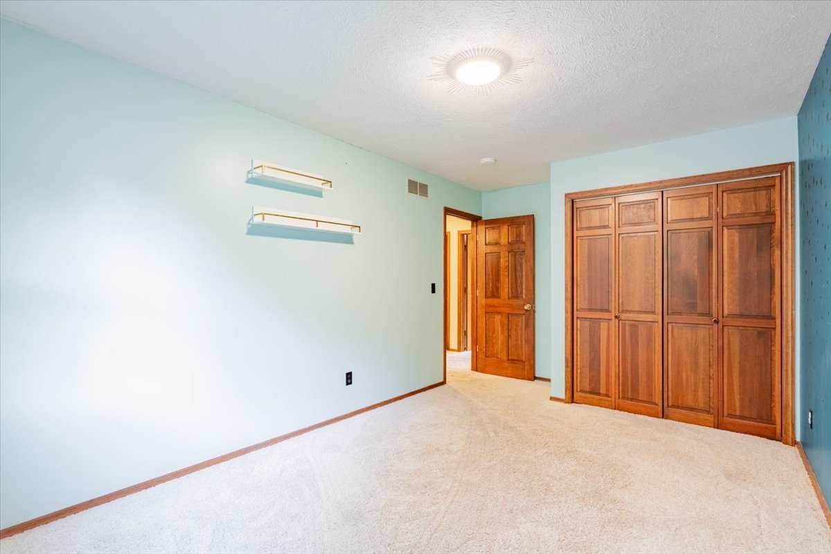 10 Inverness Drive Bloomington, IL 61701 - Photo 28 of 43 an empty room with closet area