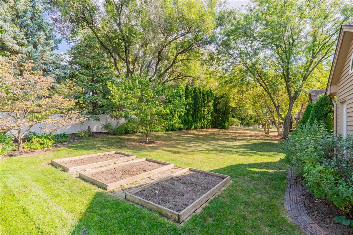 10 Inverness Drive Bloomington, IL 61701 - Photo 36 of 43 a view of a yard with swimming pool