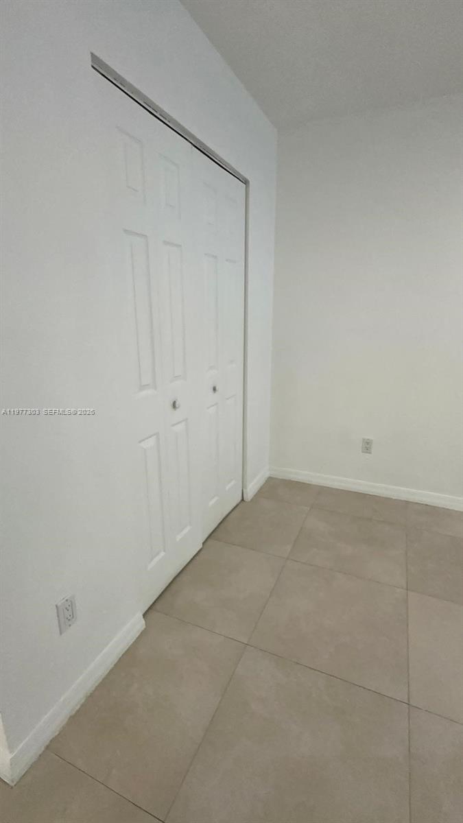 1885 West 56th Street, Unit 112 Hialeah, FL 33012 - Photo 11 of 11 a view of an empty room