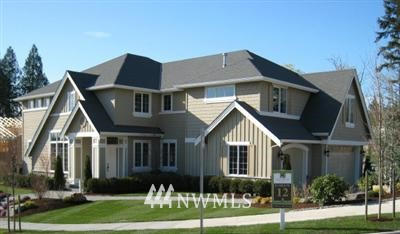 2005 240th Place Southeast Bothell, WA 98021 - Photo 1 of 1 a front view of a house with a yard