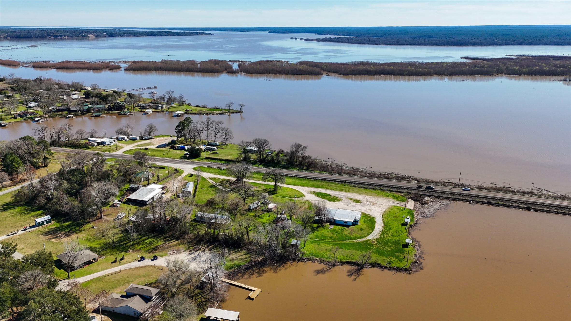 224 Steinback Avenue Trinity, TX 75862 - Photo 16 of 23 an aerial view of a houses with a lake view