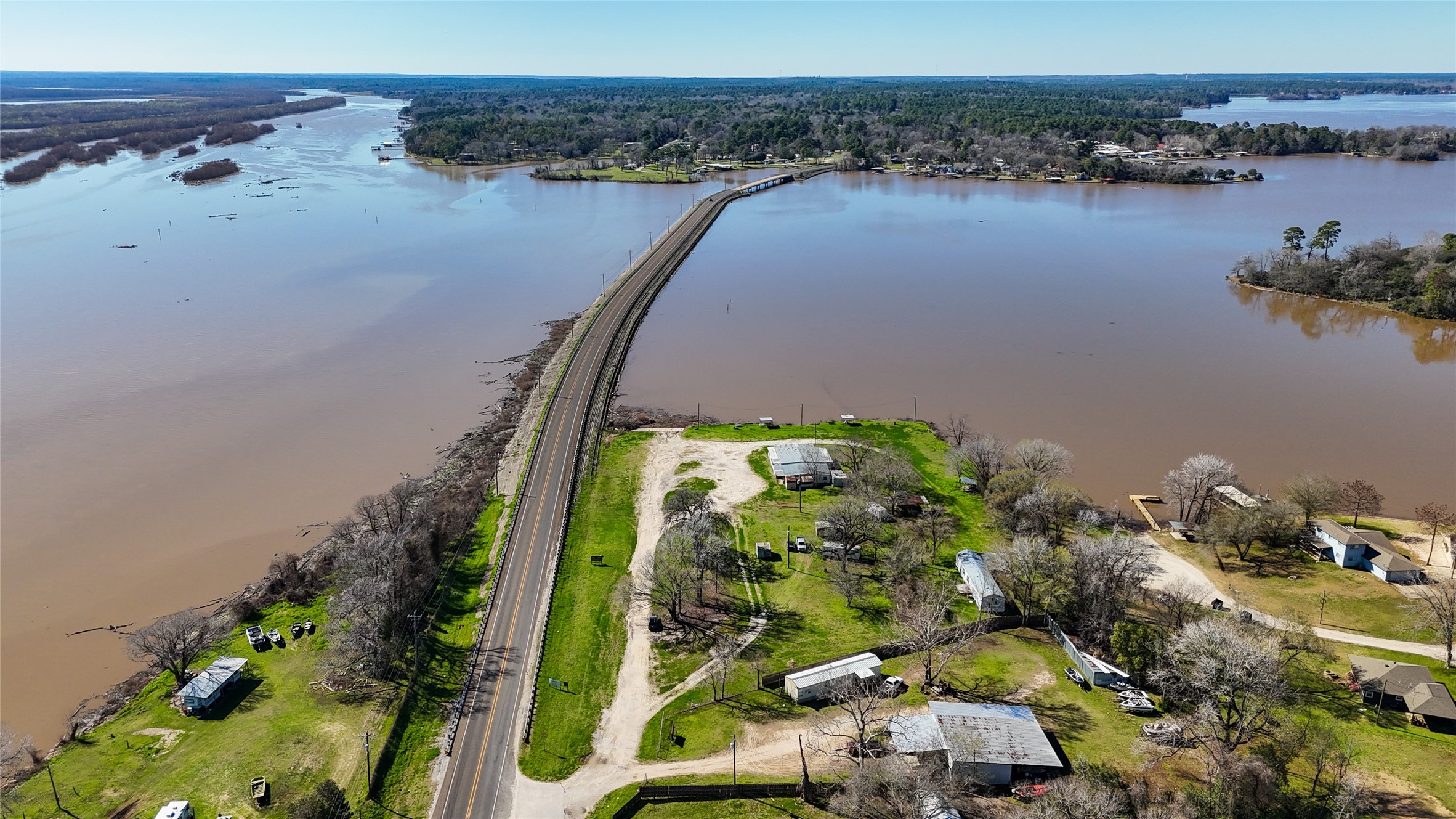 224 Steinback Avenue Trinity, TX 75862 - Photo 20 of 23 an aerial view of a house with a lake view
