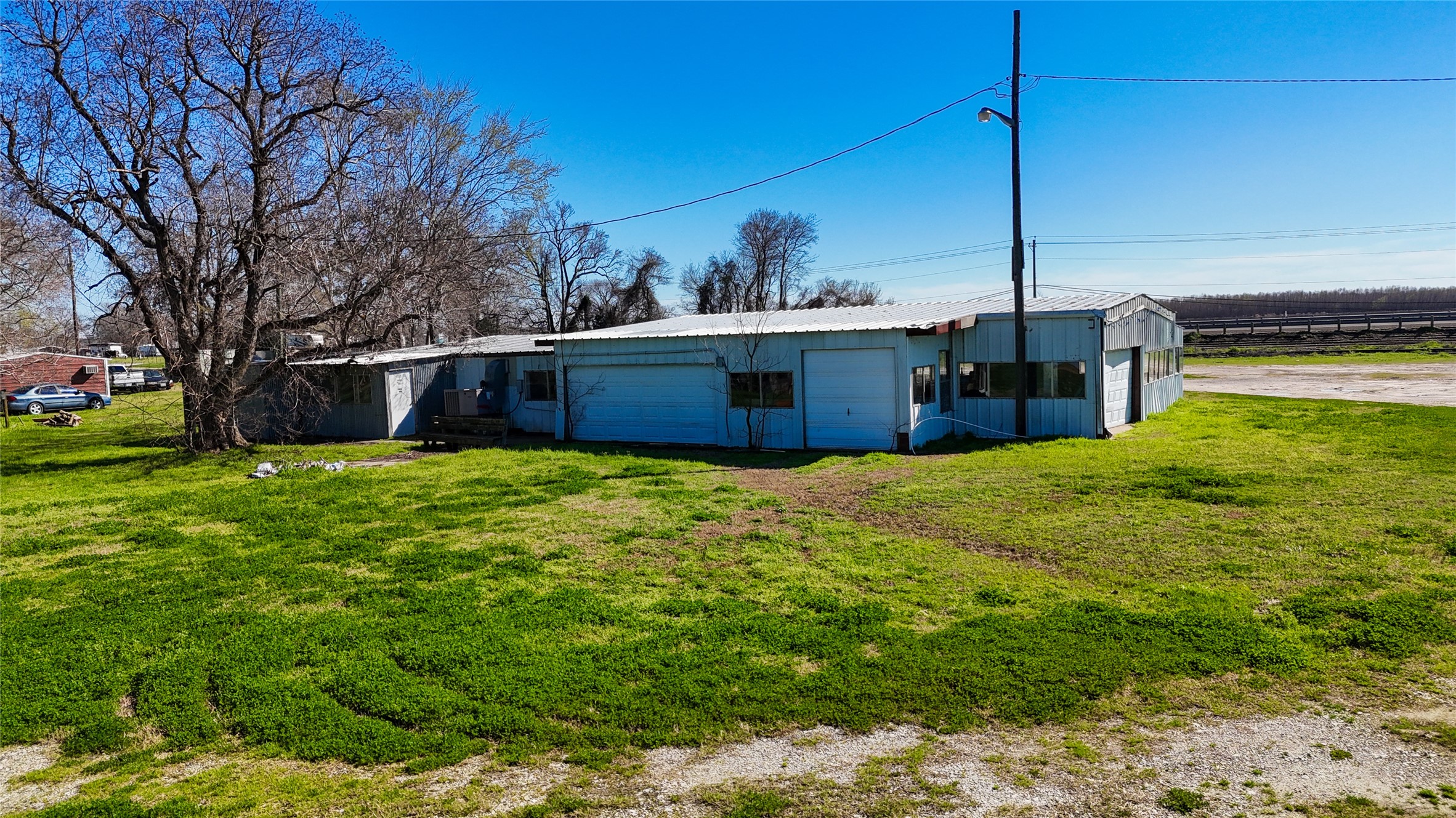 224 Steinback Avenue Trinity, TX 75862 - Photo 5 of 23 a view of a house with a big yard