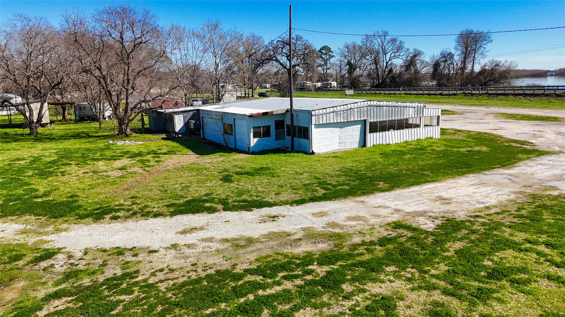 224 Steinback Avenue Trinity, TX 75862 - Photo 6 of 23 a view of a garden with trees