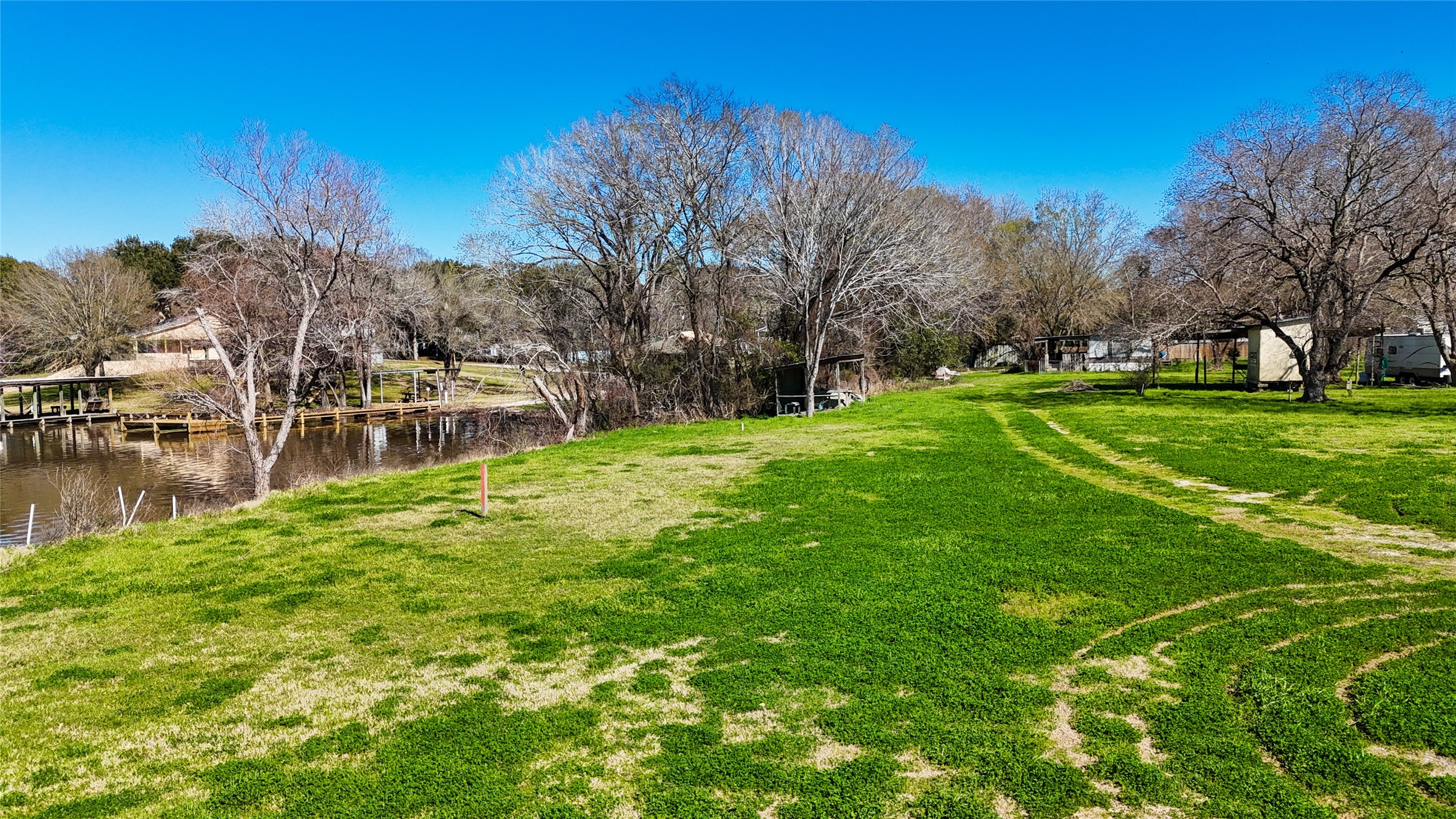 224 Steinback Avenue Trinity, TX 75862 - Photo 9 of 23 a view of a park with large trees