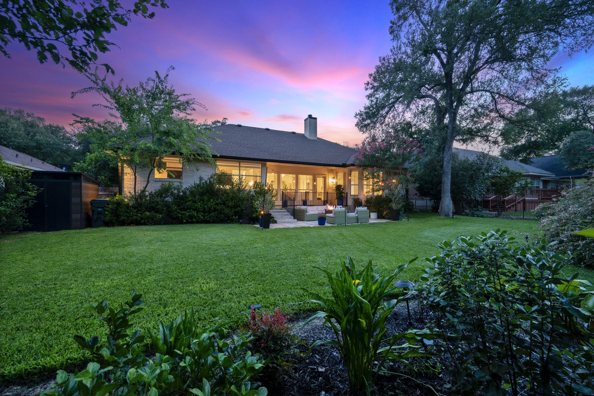 30115 Sawgrass Trail Georgetown, TX 78628 - Photo 18 of 37 A spacious lawn unfolds to a charming back patio, ideal for evening gatherings.