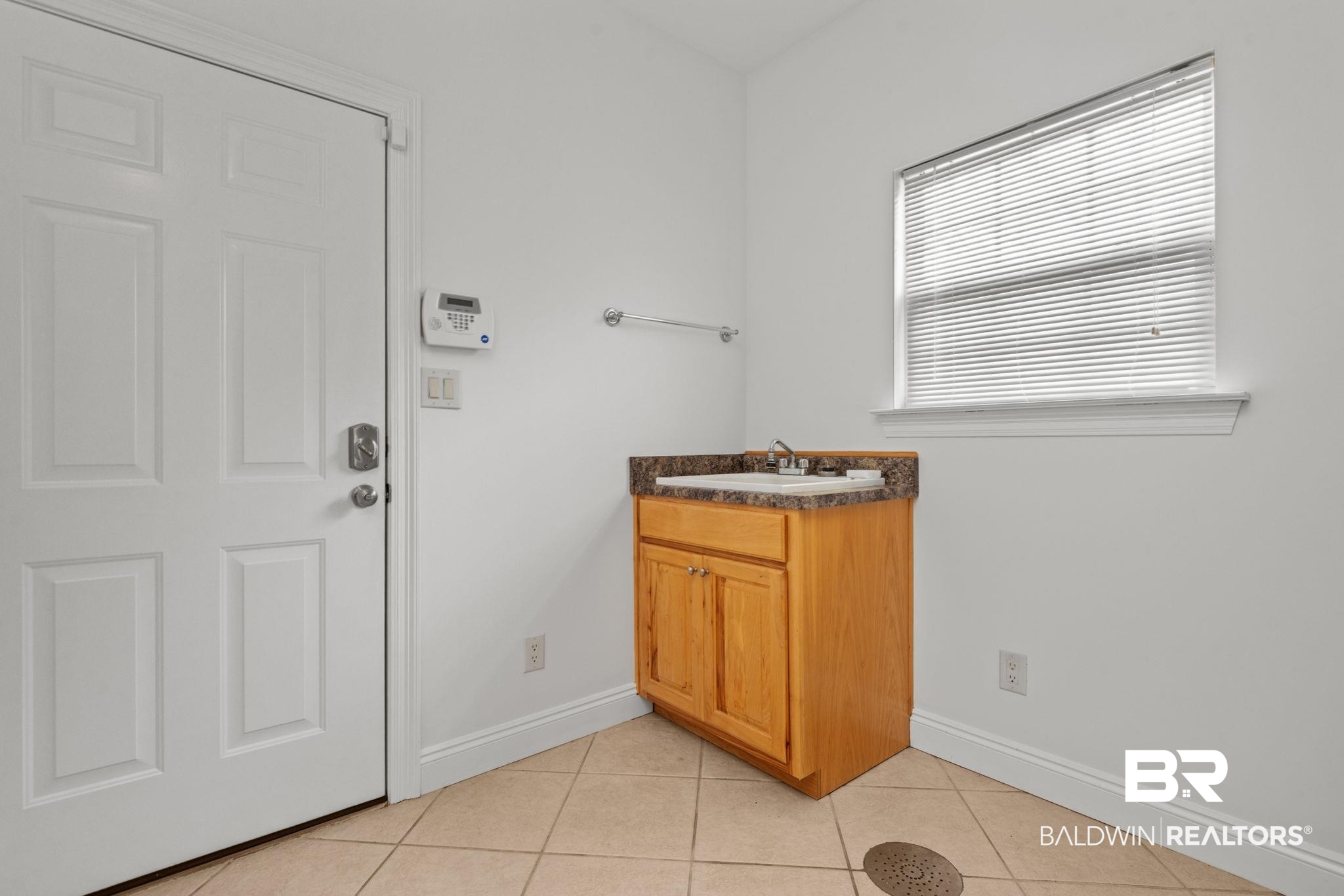 29634 St George Street Daphne, AL 36526 - Photo 38 of 47 Bathroom with vanity and light tile patterned floors