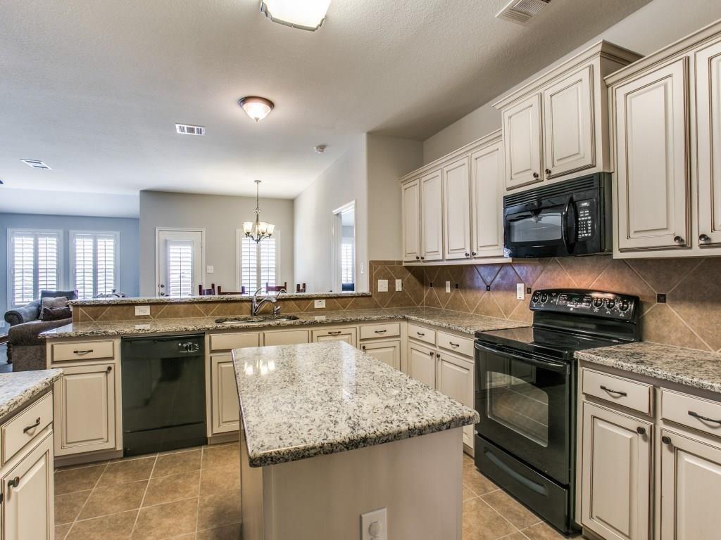 1097 Luton Drive Prosper, TX 75078 - Photo 25 of 25 a large kitchen with granite countertop lots of counter top space