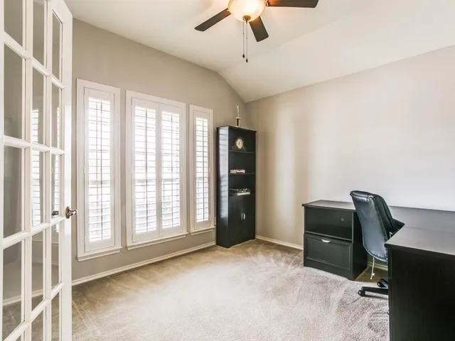 a view of room with furniture and windows