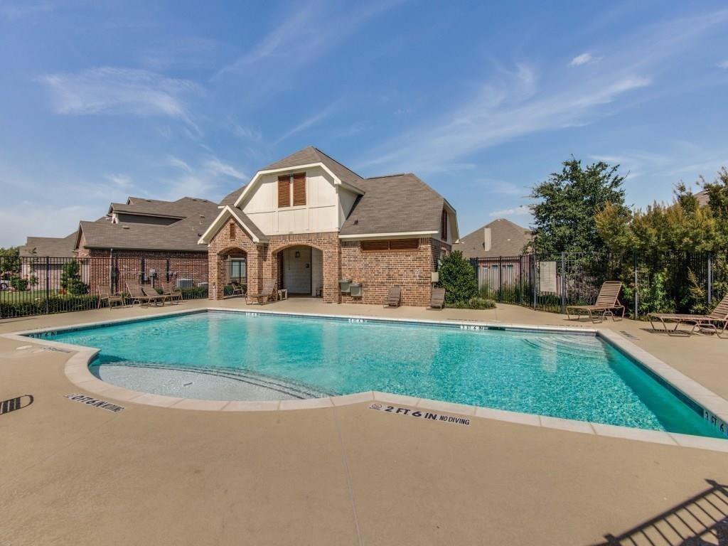 1097 Luton Drive Prosper, TX 75078 - Photo 24 of 25 a front view of a house with a yard