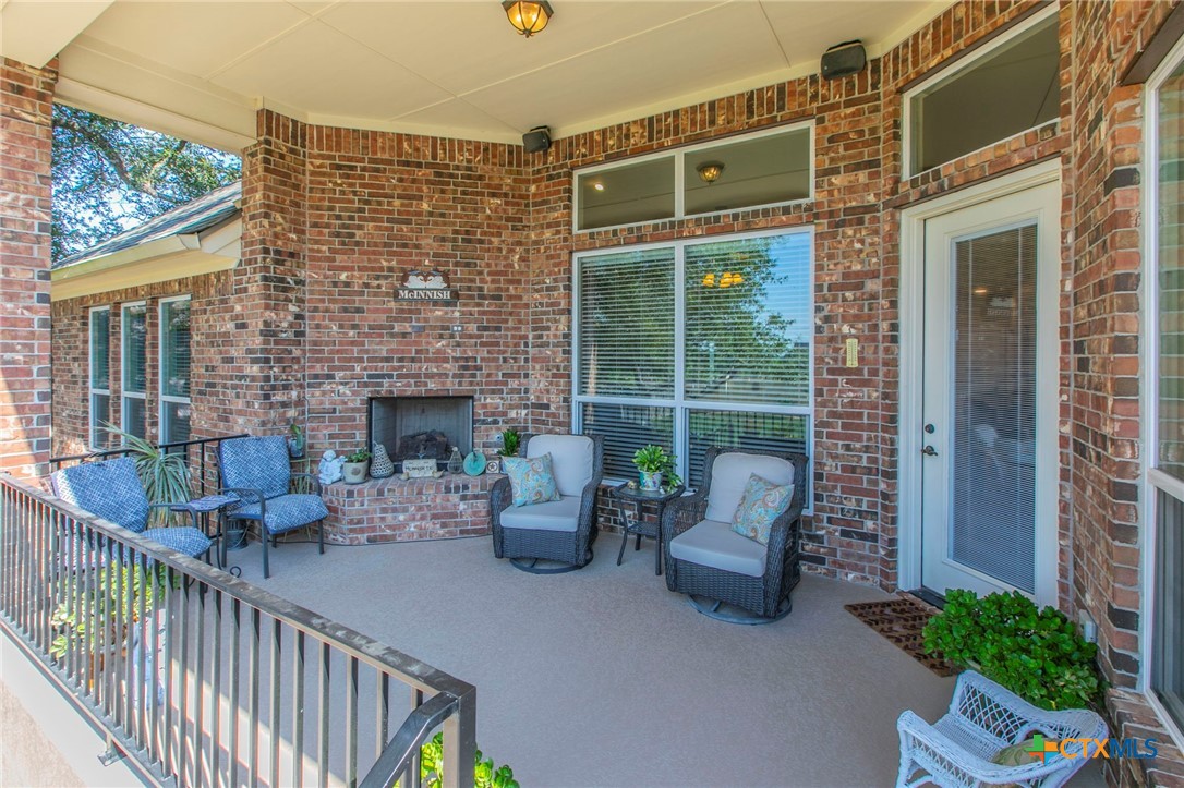 1735 Alta Vista Loop Temple, TX 76502 - Photo 28 of 41 Covered Back Patio with Fireplace