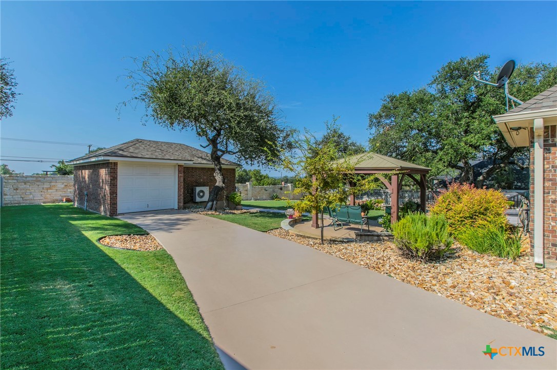 1735 Alta Vista Loop Temple, TX 76502 - Photo 34 of 41 Man Cave - 1 Car Garage perfect for a Boat