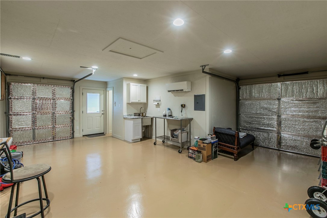 1735 Alta Vista Loop Temple, TX 76502 - Photo 36 of 41 Half Bath Shop/Man Cave - Heated and Cooled