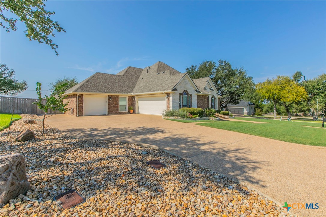 1735 Alta Vista Loop Temple, TX 76502 - Photo 39 of 41 3 car garage with extended drive back to shop/man cave for boat