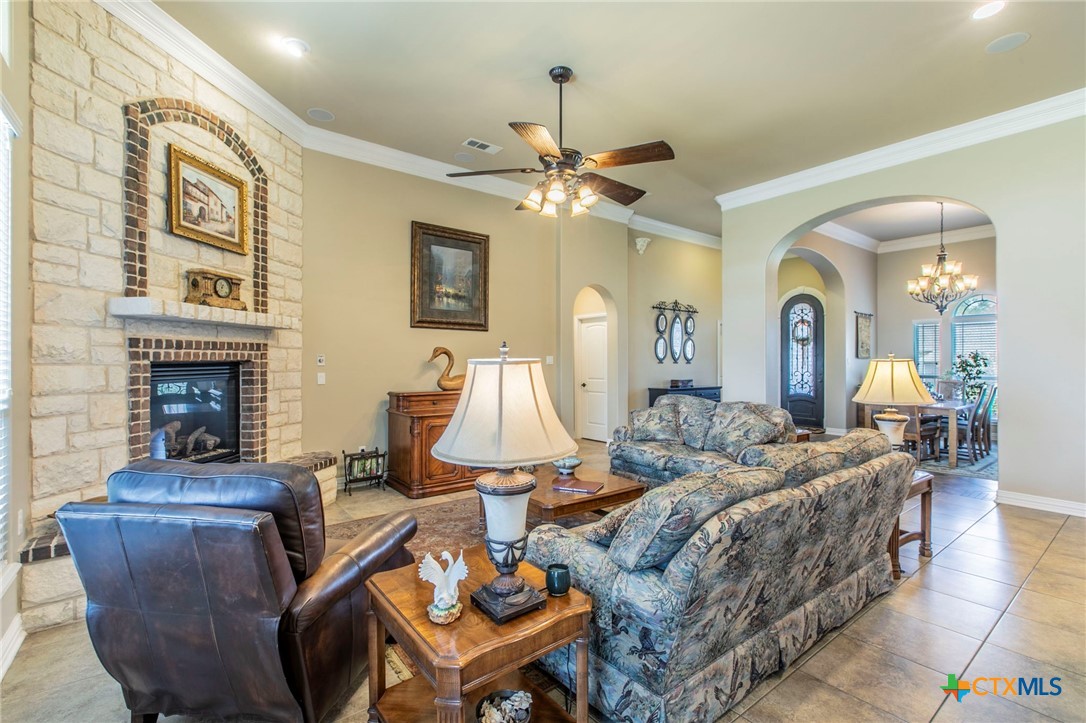 1735 Alta Vista Loop Temple, TX 76502 - Photo 8 of 41 Living Room looking back to entry and formal dining room
