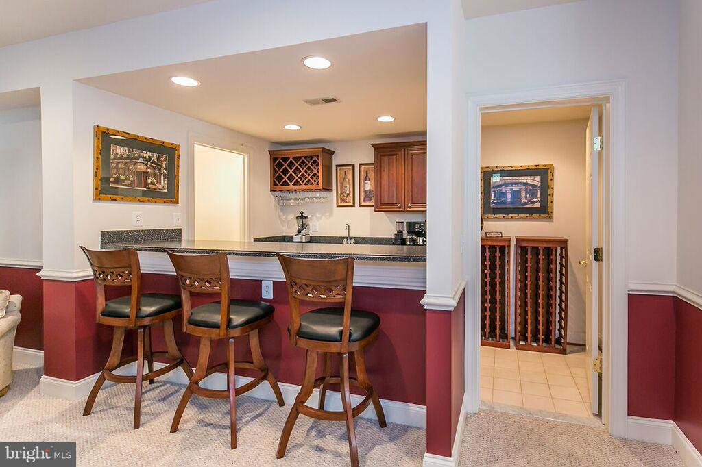 604 Clear Spring Road Great Falls, VA 22066 - Photo 20 of 28 a view of a dining room with furniture
