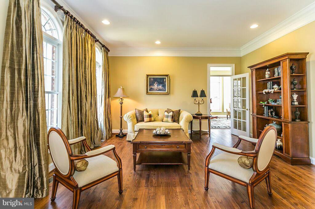 604 Clear Spring Road Great Falls, VA 22066 - Photo 4 of 28 a living room with furniture and wooden floor