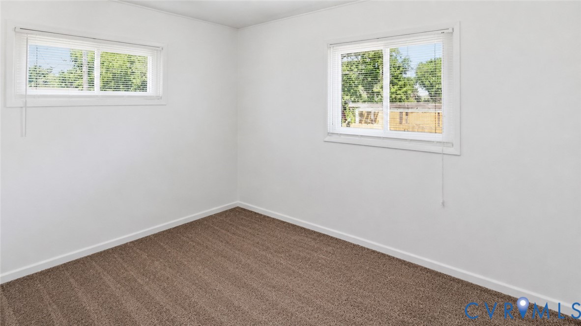 1310 Andover Road Henrico, VA 23229 - Photo 23 of 43 Room featuring textured brown carpeting, crisp whi