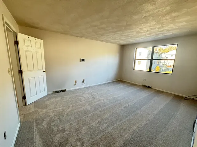 $309,900 | 402 Pinewood Drive, Smithfield, RI 02917