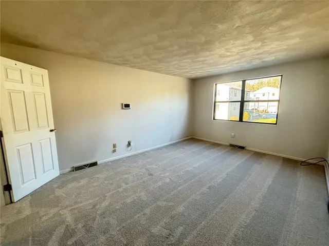 $309,900 | 402 Pinewood Drive, Smithfield, RI 02917