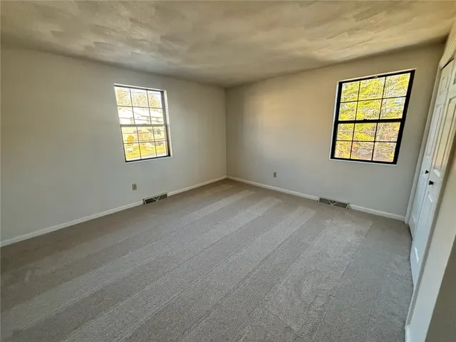 $309,900 | 402 Pinewood Drive, Smithfield, RI 02917