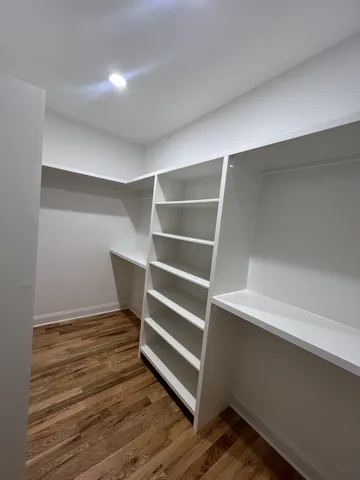 a view of an empty room with empty racks