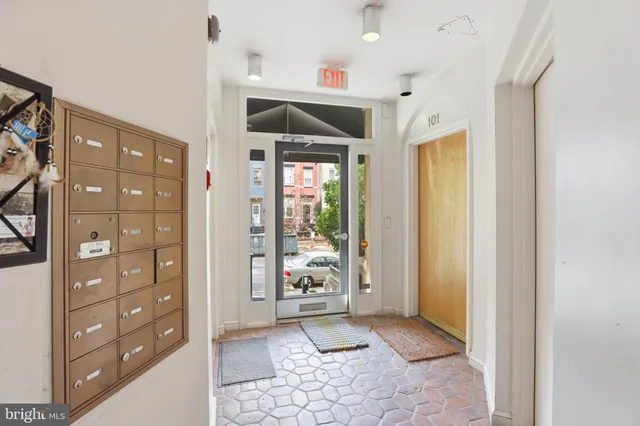a view of entryway with wooden floor