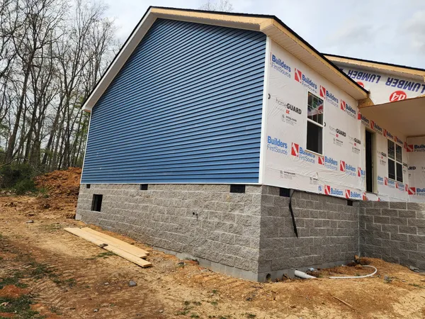 a front view of a house with garage