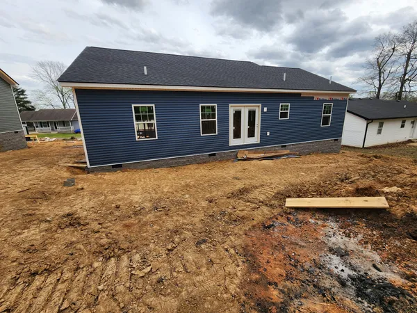 a front view of a house with yard