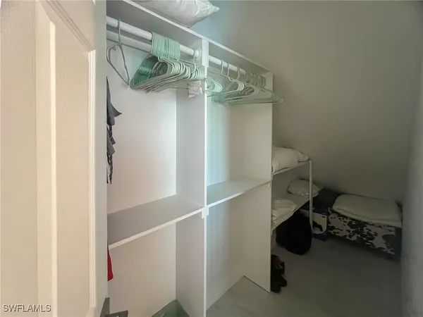 a bathroom with a toilet and a bathtub