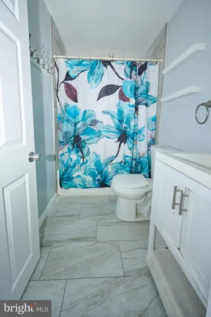 a view of a bathroom with a sink and toilet