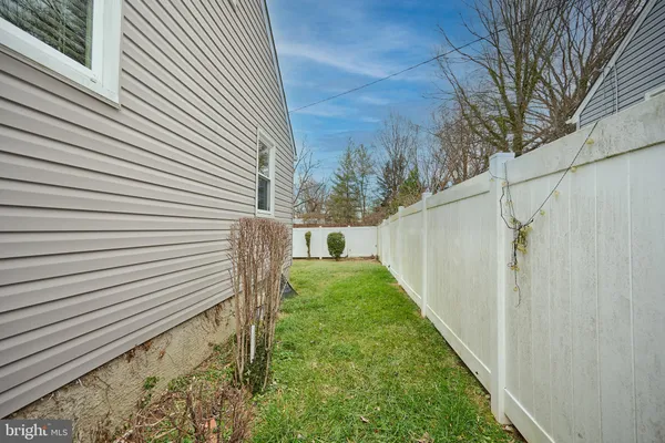 a view of a porch with a fence