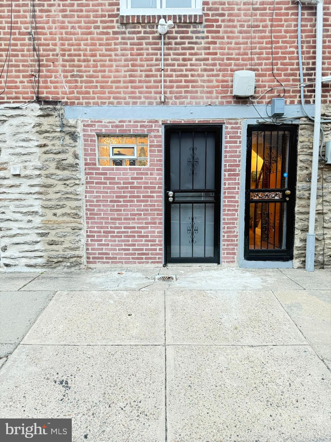 7547 Beverly Road Philadelphia, PA 19138 - Photo 26 of 32 a front view of a building with glass door
