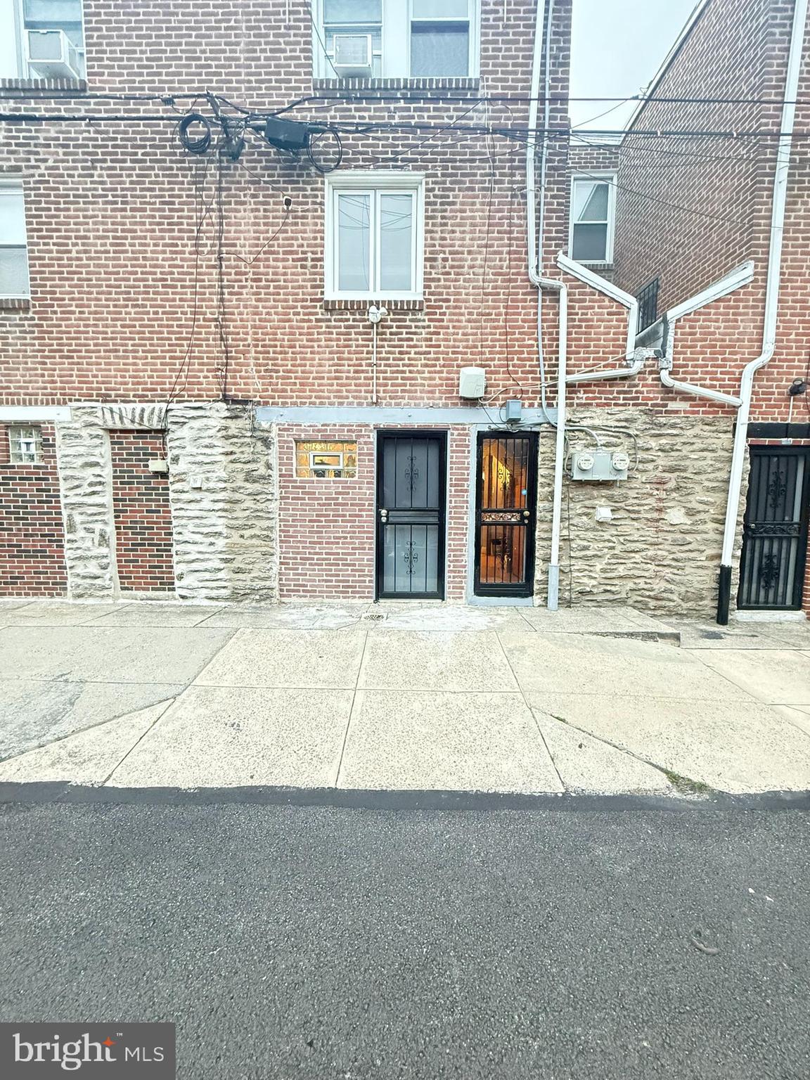 7547 Beverly Road Philadelphia, PA 19138 - Photo 28 of 32 a front view of a building with a road